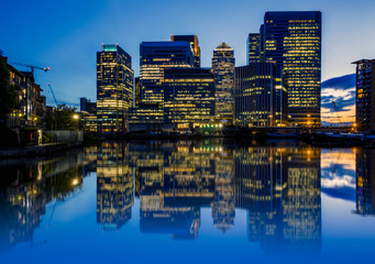 Canary Wharf seen from Blackwall Basin in London at night