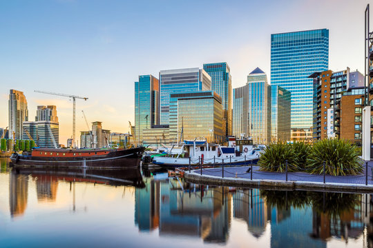 Canary Wharf seen from Blackwall Basin in London at sunset