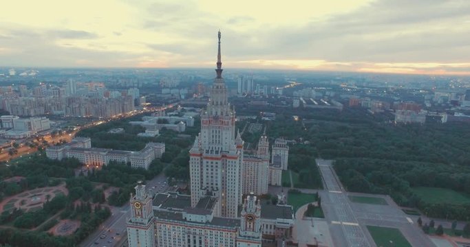 Drone Flying Near Spire of MSU Main Building in Moscow in the Dusk on a Summer Day. Epic Aerial view of the City.