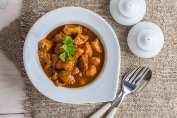 Goulash soup with pork and mushrooms.