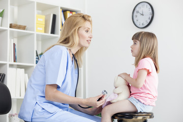 Cute little girl at doctor's office