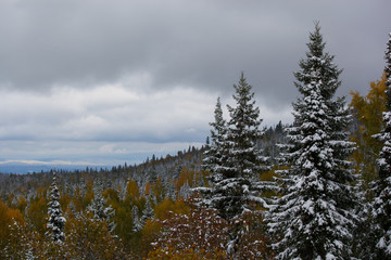 the beginning of winter in the mountains