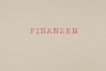 Finanzen Geld Buchstaben Stempel Schrift bedruckt Papier Aquarellpapier 