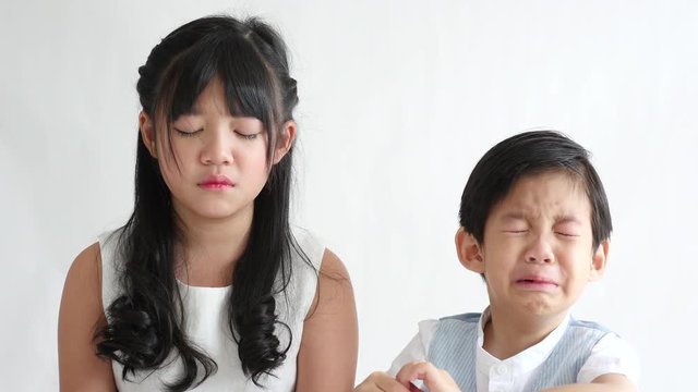 Asian children crying