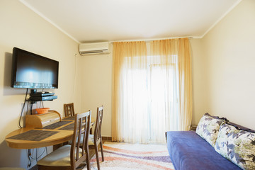 Interior of a guest house room with kitchen