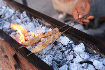 cooking traditional food kebab in xinjiang,china