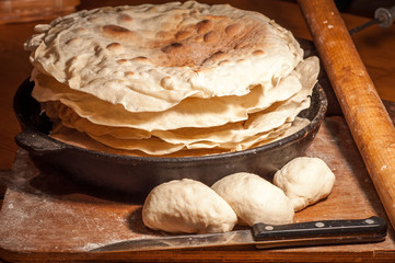 Cooking lavash on a frying pan