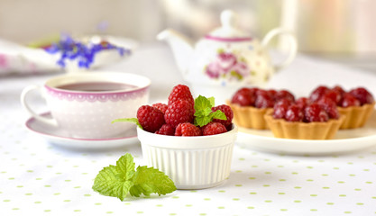 raspberries fuits in a bowl on a table