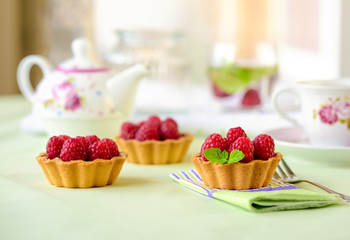 Fruit raspberry cakes on a table