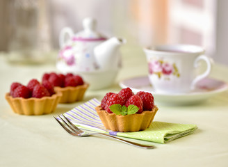Fruit raspberry cakes on a table