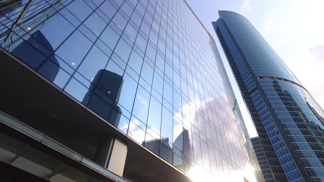 Moving among the skyscrapers, low angle shot of rotating camera (steadicam shot)