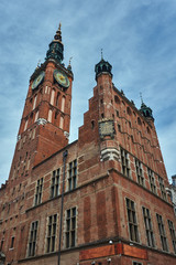 Fototapeta na wymiar The historic town hall with clock tower of the Main City in Gdansk in Poland.