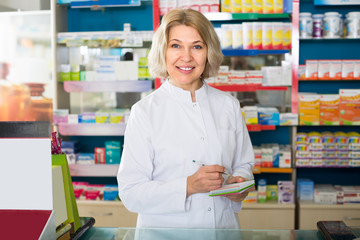 Female pharmacist in drugstore.