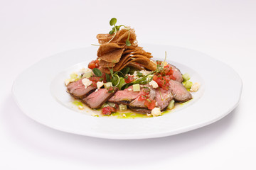 Meat dish on white background