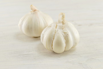 Whole and slices of garlic. Healthy vegetable