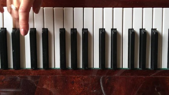 piano, close-up of piano keys and piano hands, shooting 4K