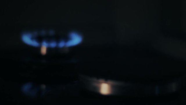 Gas burners of a stove [slow motion slide]