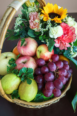 Beautiful fruits in basket with Beautiful flower