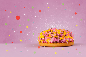 Sweet tasty cakes with colorful background and bokeh light