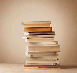 A stack of books with vintage background