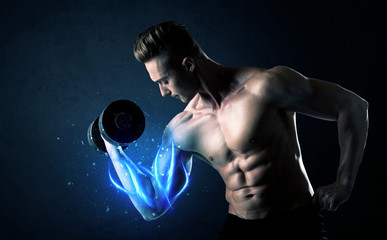 Fit athlete lifting weight with blue muscle light concept