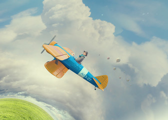 Girl flying old plane . Mixed media