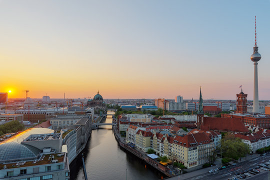 Sunset over the heart of Berlin with the river Spree and the Television Tower
