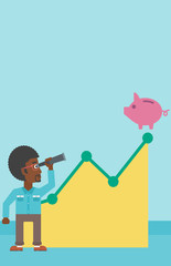 Businessman looking through spyglass at piggy bank