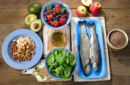 Foods for healthy Heart on a wooden table.