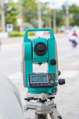 Surveyor equipment tacheometer or theodolite outdoors at construction site