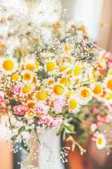 Obraz na płótnie Canvas Bouquet with wild daisies , Floral background