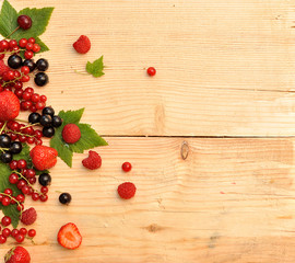 Berries on wooden background