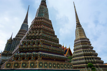 Giant chedis built for Thai kings at the historic Wat Pho in Bangkok, Thailand