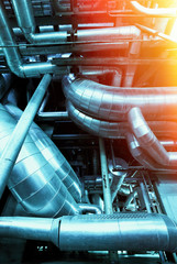 Industrial zone, Steel pipelines and valves in blue tones