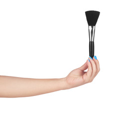 Professional make-up brush cosmetic in female hand, beautician isolated on, white background