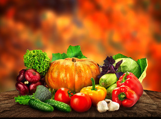 Autumn nature concept. Fall fruit and vegetables on wood. Thanks