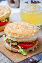 Homemade hamburger with fresh vegetables.