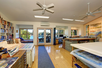 Spacious home office interior of a craftsman. Working atmosphere.