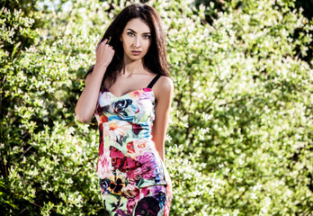 Fototapeta premium Outdoors portrait of beautiful young brunette woman.