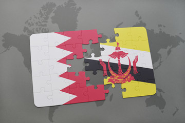 puzzle with the national flag of bahrain and brunei on a world map background.
