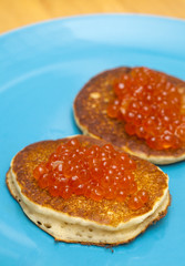 thick pancakes with salmon roe