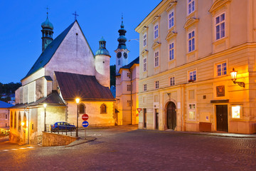 Town hall and a church in the old town of Banska Stiavnica, Slovakia.