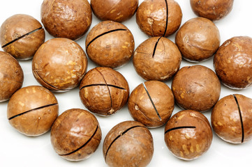 macadamia nuts on white background.