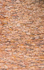wall of red stone tiles