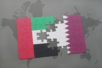 puzzle with the national flag of united arab emirates and qatar on a world map background.