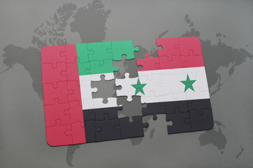 puzzle with the national flag of united arab emirates and syria on a world map background.