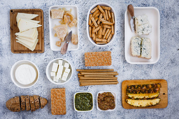 Snacker, cracker, variety cheeses and fruits.
