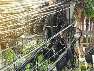 Electricity post with busy lines