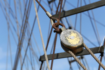 rigging of  a barquentine with wooden block