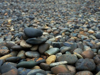 Fototapeta na wymiar Dry round reeble stones